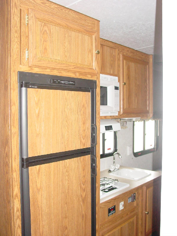 Kitchen and refrigerator