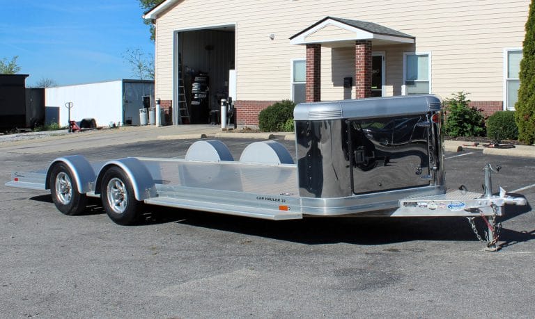 Used car hauler 2021 22' Ultra Sundowner. It includes and enclosed v-nose front, Ninja Warrior winch, slide-out ramps, removeable fenders, & extruded aluminum floor.