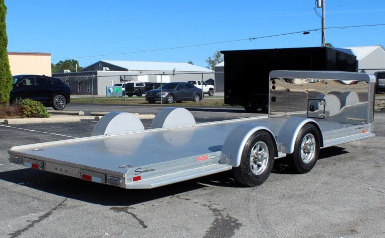 Used car hauler 2021 22' Ultra Sundowner. It includes and enclosed v-nose front, Ninja Warrior winch, slide-out ramps, removeable fenders, & extruded aluminum floor.