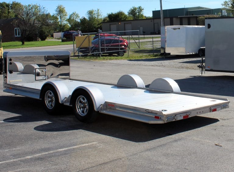 Used car hauler 2021 22' Ultra Sundowner. It includes and enclosed v-nose front, Ninja Warrior winch, slide-out ramps, removeable fenders, & extruded aluminum floor.