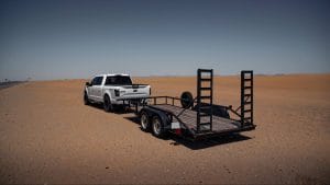 a truck and an empty trailer