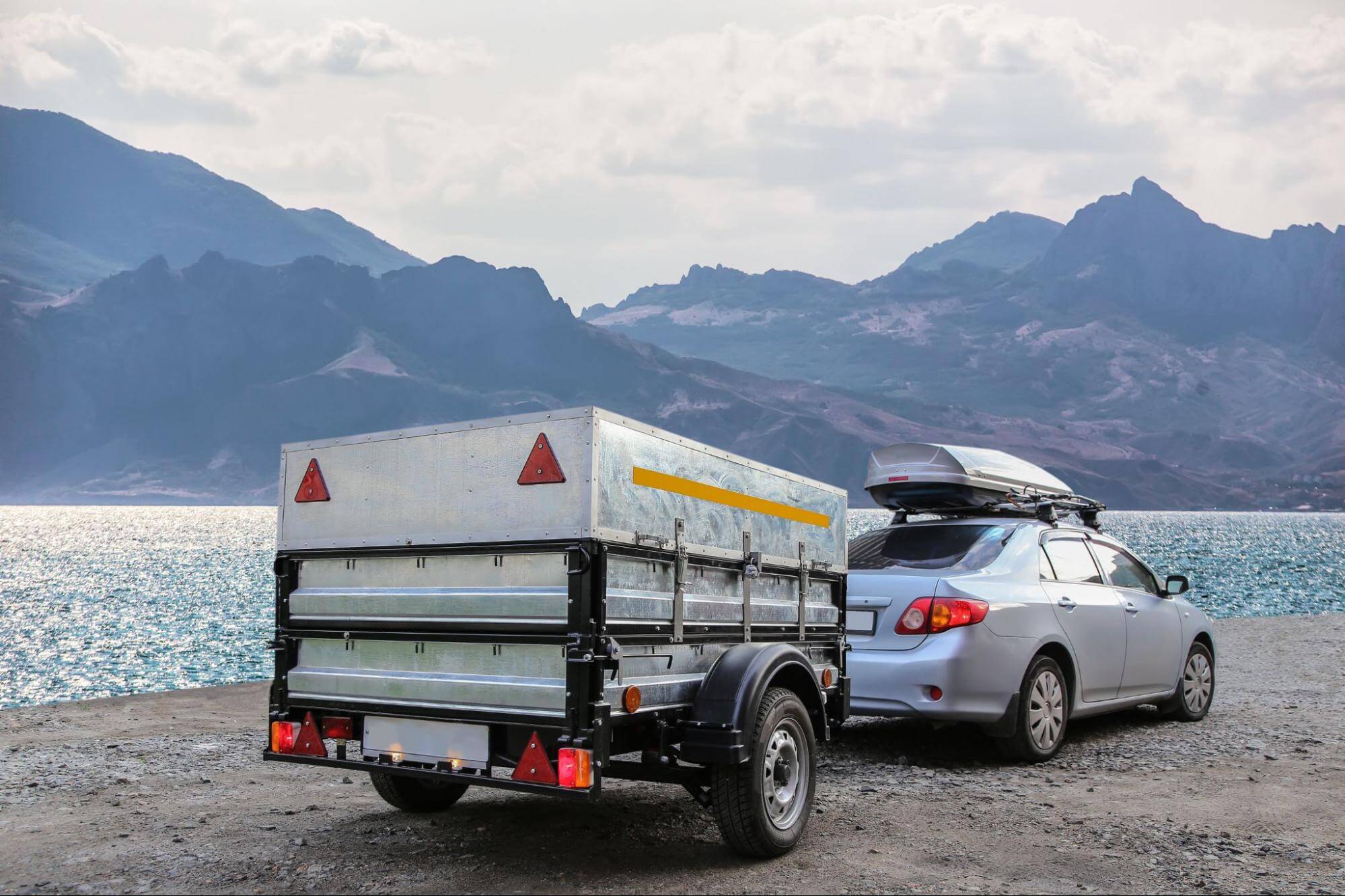 Car trailer by the sea