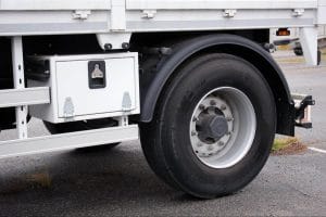 a close up at a trailer axle